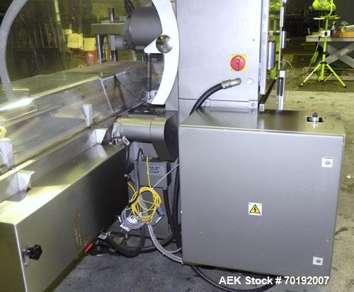 Used Rose Forgrove Integra Model RF602 Long Dwell Modified Atmosphere Horizontal Wrapper. Machine is capable of speeds up to 110 packages per minute. Has a package size range: (Width) 3/4" to 10", (H...