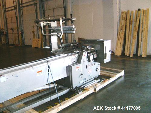 Used Allpac "Super Sanwrap" Wrapper. Model SSW is a fully automatic horizontal wrapper capable of speeds up to 120 PPM.  Has a 15' long stainless steel infeed. Ideal for sandwiches. Has belt discharg...