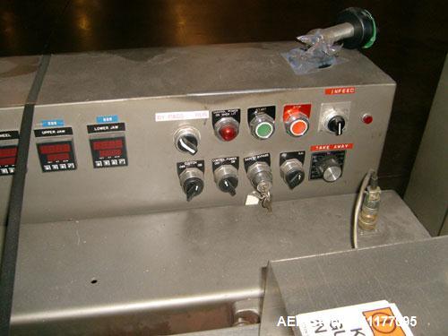 Used Allpac "Super Sanwrap" Wrapper. Model SSW is a fully automatic horizontal wrapper capable of speeds up to 120 PPM.  Has a 15' long stainless steel infeed. Ideal for sandwiches. Has belt discharg...