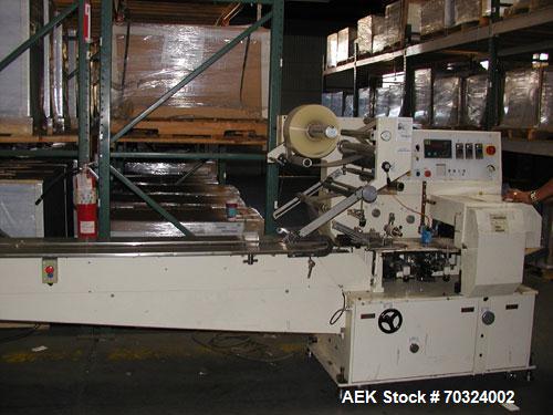 Used Sinlon Model SL-920HE Horizontal Flow Wrapper. Has print registration.