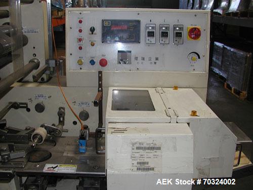 Used Sinlon Model SL-920HE Horizontal Flow Wrapper. Has print registration.