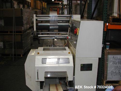 Used Sinlon Model SL-920HE Horizontal Flow Wrapper. Has print registration.