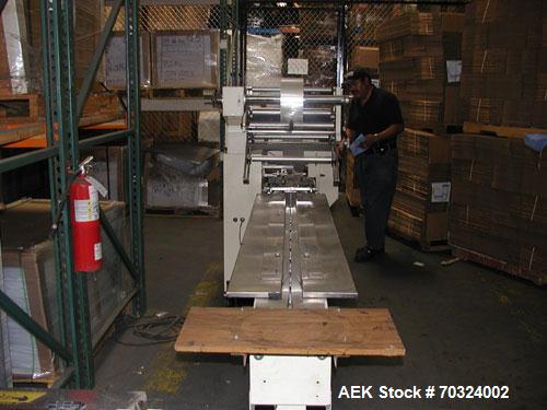 Used Sinlon Model SL-920HE Horizontal Flow Wrapper. Has print registration.