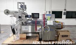 Used Fuji Horizontal Box Motion Flow Wrapper, Model FW 3410/Ba7. Machine is rated for speeds from 10 to 150 packages per min...