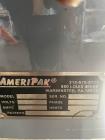 Ameripack Model 40 Horizontal Wrapper with Film Registration.