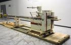 Used Ameripak Model 140S Horizontal Wrapper capable of speeds up to 100 feet per minute. Printed Film Registered Wrapper is convertible with modular fin seal assemblies for either shrink or supported...