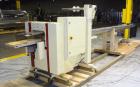 Used Ameripak Model 140S Horizontal Wrapper capable of speeds up to 100 feet per minute. Printed Film Registered Wrapper is convertible with modular fin seal assemblies for either shrink or supported...