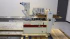 Used Ameripak Model 140S Horizontal Wrapper capable of speeds up to 100 feet per minute. Printed Film Registered Wrapper is convertible with modular fin seal assemblies for either shrink or supported...