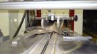 Used Ameripak Model 140S Horizontal Wrapper capable of speeds up to 100 feet per minute. Printed Film Registered Wrapper is convertible with modular fin seal assemblies for either shrink or supported...