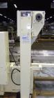 Used Ameripak Model 140S Horizontal Wrapper capable of speeds up to 100 feet per minute. Printed Film Registered Wrapper is convertible with modular fin seal assemblies for either shrink or supported...