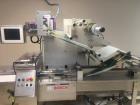 Used Bosch Horizontal Flow Wrapper, Model Pack 201. Machine is rated for speeds up to 450 packages per minute (depending on package size and changeparts). Has a size range of: 40 mm (1.5