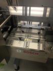 Used Bosch Horizontal Flow Wrapper, Model Pack 201. Machine is rated for speeds up to 450 packages per minute (depending on package size and changeparts). Has a size range of: 40 mm (1.5
