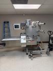 Used Bosch Horizontal Flow Wrapper, Model Pack 201. Machine is rated for speeds up to 450 packages per minute (depending on package size and changeparts). Has a size range of: 40 mm (1.5