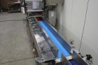Used Cambell Revolution Horizontal Stainless Steel Washdown Wrapper. Designed for structured resistance sealed film. (Unused condition, New in 2014!) High speed unit with automatic servo belt infeed....
