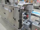 Used Cambell Revolution Horizontal Stainless Steel Washdown Wrapper. Designed for structured resistance sealed film. (Unused condition, New in 2014!) High speed unit with automatic servo belt infeed....