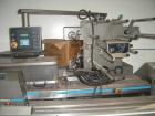 USED: Doboy Aurora wrapper, manufactured early 1998, 70-80m. Aurora was a limited production model, produced for use between J Wrapper and Supermustang. It includes the wrapper, 30 foot infeed convey...