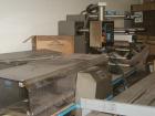 USED: Doboy Aurora wrapper, manufactured early 1998, 70-80m. Aurora was a limited production model, produced for use between J Wrapper and Supermustang. It includes the wrapper, 30 foot infeed convey...