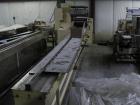 Used Doboy Model J Horizontal Wrapper capable of speeds over 200 packages per minute. Film registration, 1 up sealing head 12