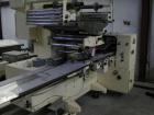 Used Doboy Model J Horizontal Wrapper capable of speeds over 200 packages per minute. Film registration, 1 up sealing head 12