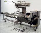 Used Bosch (Doboy) Linium 311 horizontal wrapper. Parts Machine Only.  1 up crimper capable of speeds up to 150 packages per minute (can run up to 350 packages per minute on a 2 up configuration). Ha...