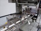 Used Bosch (Doboy) Linium 311 horizontal wrapper. Parts Machine Only.  1 up crimper capable of speeds up to 150 packages per minute (can run up to 350 packages per minute on a 2 up configuration). Ha...