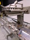 Used Bosch (Doboy) Linium 311 horizontal wrapper. Parts Machine Only.  1 up crimper capable of speeds up to 150 packages per minute (can run up to 350 packages per minute on a 2 up configuration). Ha...