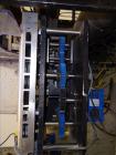 Used Bosch (Doboy) Linium 311 horizontal wrapper. Parts Machine Only.  1 up crimper capable of speeds up to 150 packages per minute (can run up to 350 packages per minute on a 2 up configuration). Ha...