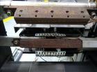 Used Bosch (Doboy) Linium 311 horizontal wrapper. Parts Machine Only.  1 up crimper capable of speeds up to 150 packages per minute (can run up to 350 packages per minute on a 2 up configuration). Ha...