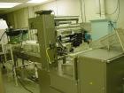 Used Doboy Mustang IV Horizontal Wrapper capable of speeds up to 150 cpm. 2 up unit with Markem 9820 hot stamp coder. Package size range up to 6-1/2