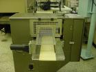 Used Doboy Mustang IV Horizontal Wrapper capable of speeds up to 150 cpm. 2 up unit with Markem 9820 hot stamp coder. Package size range up to 6-1/2