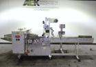 Used Doboy Mustang IV Horizontal Wrapper. Machine is capable of speeds up to 90 cpm. The Doboy is a 1 up unit with film registration and an Argus bar code scanner. Package size range: length up to 15...
