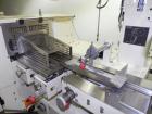 Used Doboy Mustang IV Horizontal Wrapper. Machine is capable of speeds up to 90 cpm. The Doboy is a 1 up unit with film registration and an Argus bar code scanner. Package size range: length up to 15...