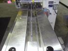Used Doboy Model Mustang IV Horizontal Wrapper. Machine is capable of speeds up to 90 cpm. 1 up unit withh film registration andArgus bar code scanner. Package size range: length up to 15