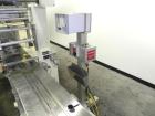 Used Doboy Model Mustang IV Horizontal Wrapper. Machine is capable of speeds up to 90 cpm. 1 up unit withh film registration andArgus bar code scanner. Package size range: length up to 15