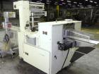 Used Doboy Mustang IV Horizontal Wrapper. Machine is capable of speeds up to 150 cpm. 1 up unit with film registration andArgus bar code scanner. Package size range: length up to 15