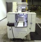 Used Doboy Mustang IV Horizontal Wrapper. Machine is capable of speeds up to 150 cpm. 1 up unit with film registration andArgus bar code scanner. Package size range: length up to 15