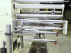 Used Doboy Mustang IV Horizontal Wrapper. Machine is capable of speeds up to 150 cpm. 1 up unit with film registration andArgus bar code scanner. Package size range: length up to 15