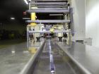 Used Doboy Mustang IV Horizontal Wrapper. Machine is capable of speeds up to 150 cpm. 1 up unit with film registration andArgus bar code scanner. Package size range: length up to 15