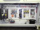 Used Doboy Mustang IV Horizontal Wrapper. Machine is capable of speeds up to 150 cpm. 1 up unit with film registration andArgus bar code scanner. Package size range: length up to 15