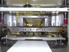 Used Doboy Mustang IV Horizontal Wrapper. Machine is capable of speeds up to 150 cpm. 1 up unit with film registration andArgus bar code scanner. Package size range: length up to 15