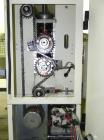 Used Doboy Mustang IV Horizontal Wrapper. Machine is capable of speeds up to 150 cpm. 1 up unit with film registration andArgus bar code scanner. Package size range: length up to 15