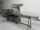 Used Doboy Mustang IV Horizontal Wrapper. Machine is capable of speeds up to 150 cpm. 2 up unit with film registration. Package size range: length up to 15