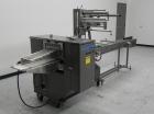 Used Doboy Mustang IV Horizontal Wrapper. Machine is capable of speeds up to 150 cpm. 2 up unit with film registration. Package size range: length up to 15