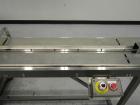 Used Doboy Mustang IV Horizontal Wrapper. Machine is capable of speeds up to 150 cpm. 2 up unit with film registration. Package size range: length up to 15