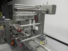 Used Doboy Mustang IV Horizontal Wrapper. Machine is capable of speeds up to 150 cpm. 2 up unit with film registration. Package size range: length up to 15