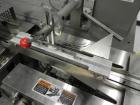 Used Doboy Mustang IV Horizontal Wrapper. Machine is capable of speeds up to 150 cpm. 2 up unit with film registration. Package size range: length up to 15