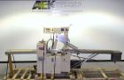 Used Doboy Mustang Horizontal Wrapper. Capable of speeds up to 90 packages per minute. Has a package size range of 1/2