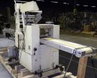 Used Doboy Mustang Horizontal Wrapper. Capable of speeds up to 90 packages per minute. Has a package size range of 1/2