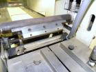 Used Doboy Mustang Horizontal Wrapper. Capable of speeds up to 90 packages per minute. Has a package size range of 1/2