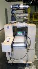 Used Doboy Mustang Horizontal Wrapper. Machine is capable of speeds up to 96 packages per minute. Has a one up head, print registration and Markem 984 hot stamp date coder. Machine has SmartEye senso...